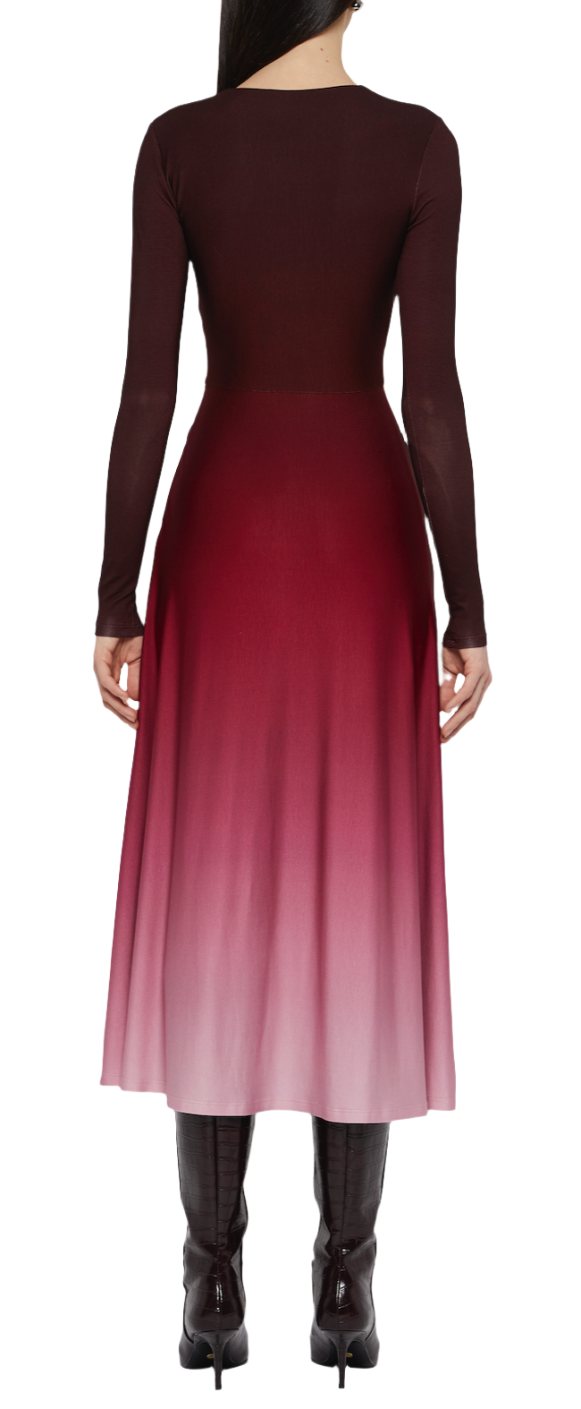 A person wearing a Prabal Gurung Twist Front Long Sleeve Dress featuring an ombre design transitioning from burgundy to pink, paired with black boots, seen from behind.