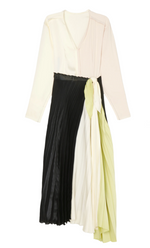 The Victoria Beckham Long Sleeve Pleated Dress by Victoria Beckham boasts a white top paired with a color-blocked skirt featuring black, white, and light green hues. This elegant piece, crafted in Portugal from premium polyester, showcases a sophisticated pleated design.