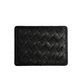 Introducing the Bembien Nico Card Case, a black rectangular wallet with a quilted pattern that combines sleek elegance and practical storage in a minimalist card holder.