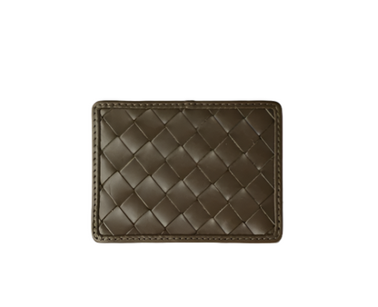 The Bembien Nico Card Case is a minimalist woven leather wallet, featuring a sleek design on a white background for effortless style and practicality.