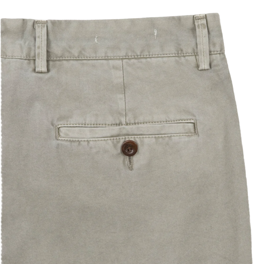 The close-up highlights the back pocket of the Sid Masburn Garment Dyed Field Pant, crafted from lightweight cotton twill. These slim-straight trousers feature a single brown button and belt loops. The beige pants from Sid Mashburn have been garment-dyed for a unique finish.