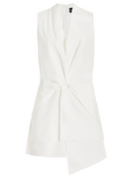 Brandon Maxwell Savie Top, a white sleeveless wrap crafted from 100% cotton, showcases a draped waist and asymmetrical hem with a discreet back zipper.