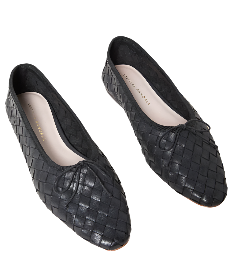 Loeffler Randall Landry Woven Flats feature a black woven leather design, bows on the front, and a padded leather footbed for added comfort.