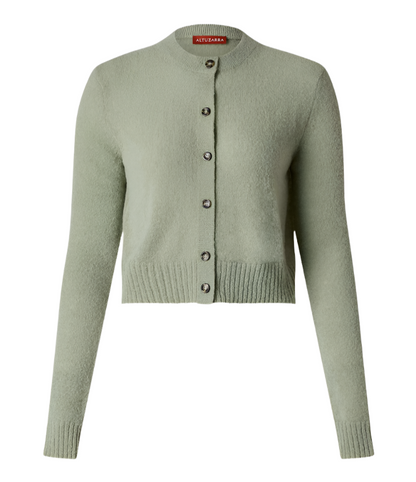 The Altuzarra Thea Sweater is a light green, long-sleeve alpaca cardigan featuring a round neckline and front button closure.