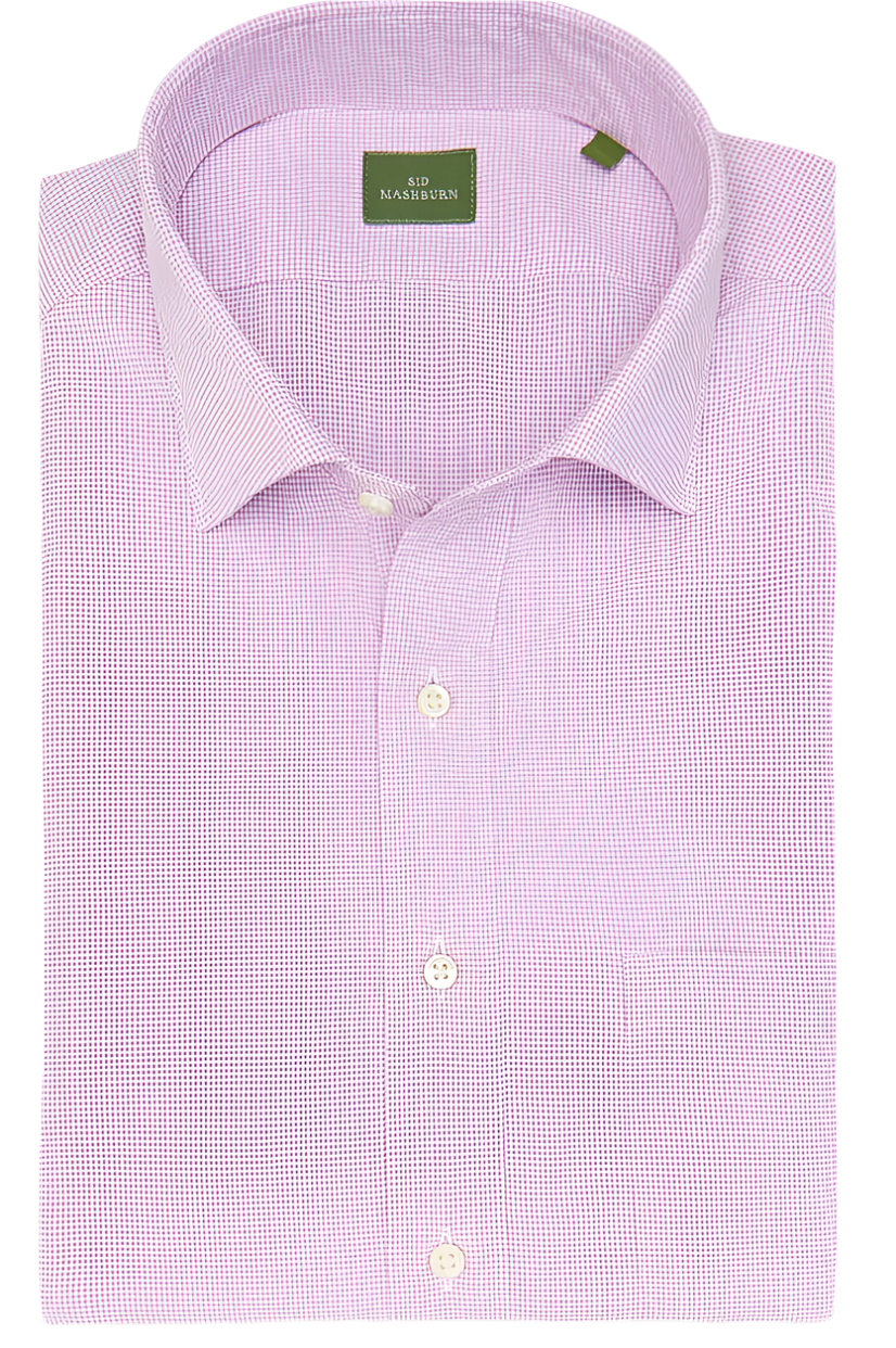 The Sid Mashburn Spread Collar Dress Shirt, crafted from pink tattersall poplin, is neatly folded and buttoned, with the label visible inside the collar.