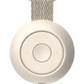 The Rest Go Sounds Machine by Hatch is a round, white portable wireless speaker with a central button, volume controls, and a beige fabric strap.