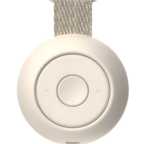 The Rest Go Sounds Machine by Hatch is a round, white portable wireless speaker with a central button, volume controls, and a beige fabric strap.