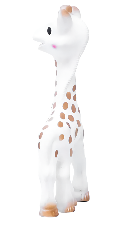 A side view of the charming Sophie la Girafe toy showcases its brown spots and white body, standing upright like a teether against a pristine white background.