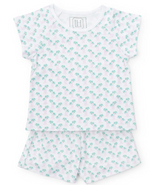 The Lila & Hayes Girls' Emery Short Set includes a Pima cotton white short-sleeve shirt and light green palm tree pattern shorts with an elastic waistband for comfort.