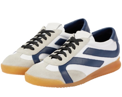 Proenza Schouler Track Sneakers in white and navy blue feature black laces, gum soles, suede accents, striped sides, and a memory foam insole for ultimate comfort.