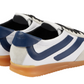 The Proenza Schouler Track Sneakers are white nappa leather with blue accents, gum soles, and a rear embossed logo.