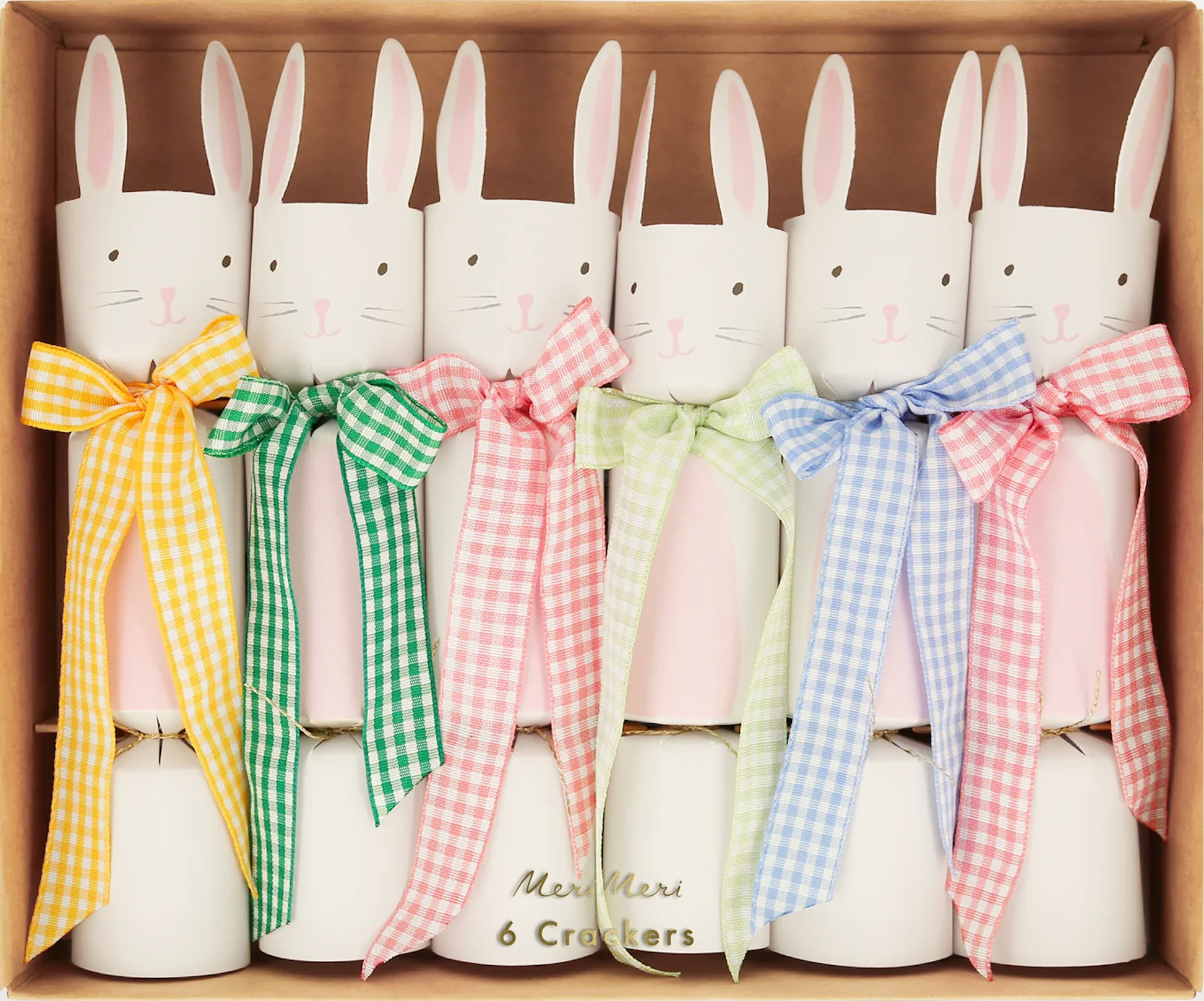 Meri Meri's Gingham Bow Bunny Crackers come in a box of six, featuring luxury designs with gingham ribbons in green, yellow, pink, and blue. These crackers are a delightful springtime addition perfect for Easter celebrations.