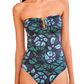 Model wearing the Ulla Johnson Monterey Maillot One Piece, a strapless swimsuit with a blue and green abstract floral print, subtle sweetheart neckline, and full coverage bottom.
