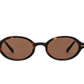 The Elvie Sunglasses by Jimmy Fairly feature an oval-shaped tortoiseshell cellulose acetate frame with brown tinted lenses, shown front-facing on a white background.