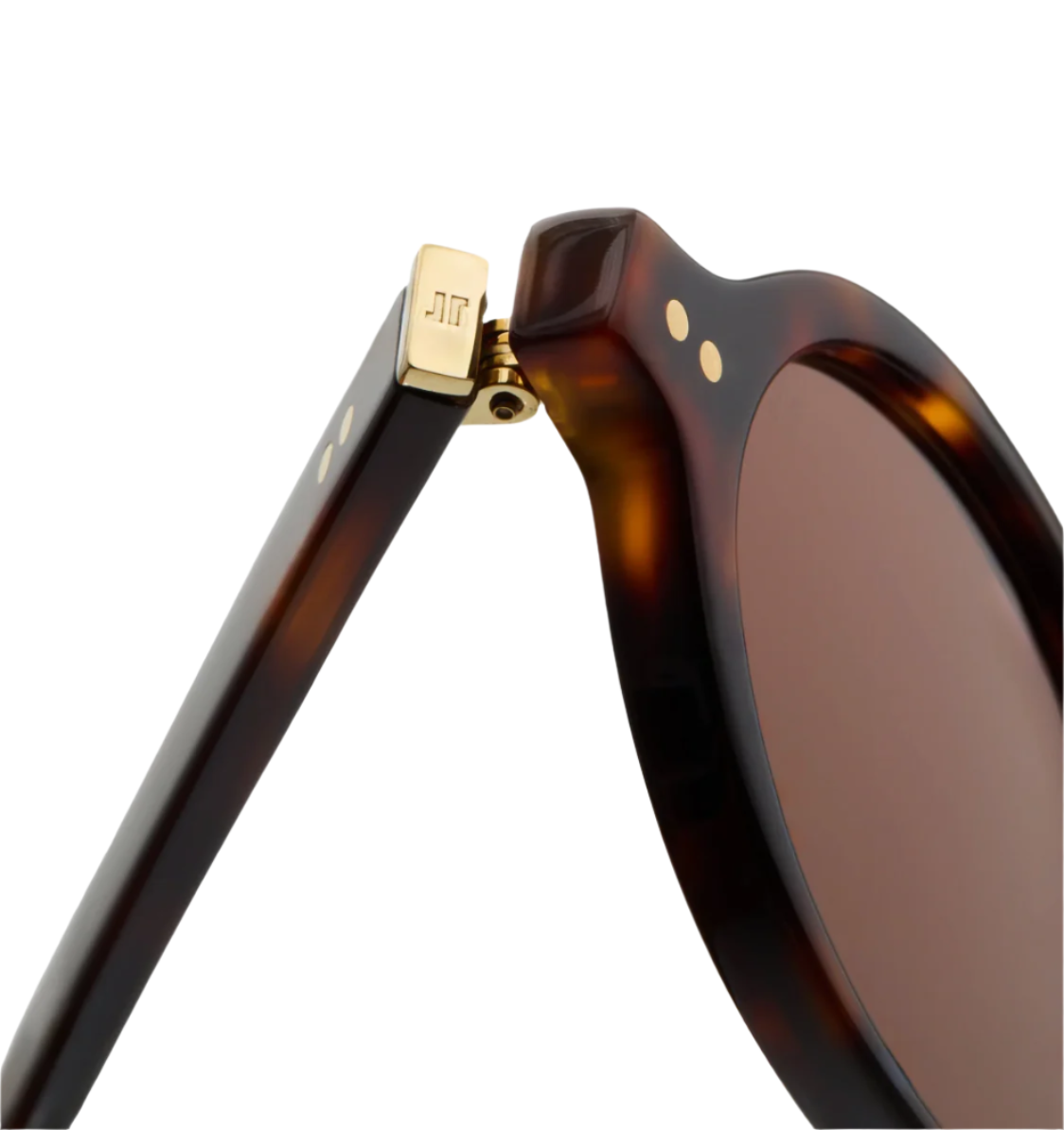 Close-up of Jimmy Fairly Elvie sunglasses: tortoiseshell oval frame in sturdy cellulose acetate, metal hinge with gold detail, engraved logo, and brown lenses.