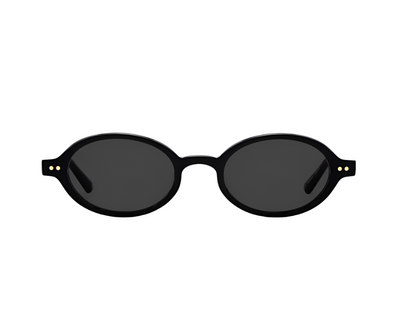 The Elvie Sunglasses by Jimmy Fairly feature a black oval frame, dark lenses, and subtle gold dots on the metal hinge, crafted from premium cellulose acetate and shown against a white background.