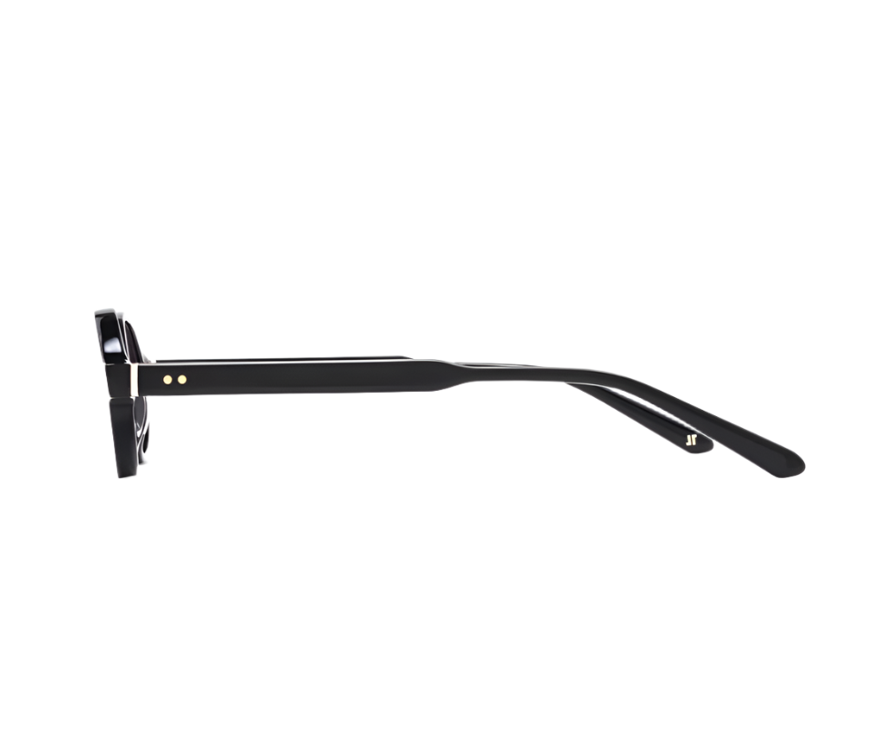 The Elvie Sunglasses by Jimmy Fairly are shown from the side against a white background, featuring a black oval frame in cellulose acetate with straight arms and two small gold dots by the metal hinge.