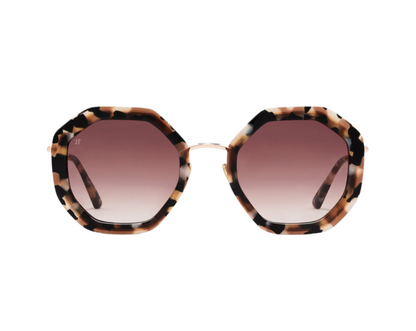 The Angie Sunglasses by Jimmy Fairly feature an octagonal tortoiseshell acetate frame with gradient brown lenses, displayed against a white background.