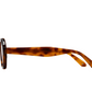 Side view of Jimmy Fairly Freja Sunglasses—brown tortoiseshell rectangular frames with curved arms, made from durable cellulose acetate—displayed on a white background.