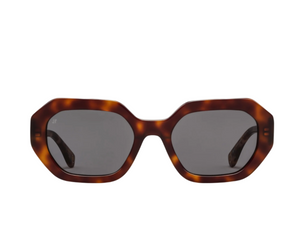 The Jimmy Fairly Portofino Sunglasses feature thick, geometric brown tortoiseshell frames and dark lenses made from recycled acetate, shown against a white background.