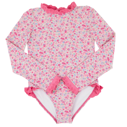 The Beaufort Bonnet Company's Baby Girls and Girls' Sarasota Surf Suit features long sleeves, a pink floral design, ruffled collar and leg openings, pink lace trim, and built-in sun protection for stylish comfort.