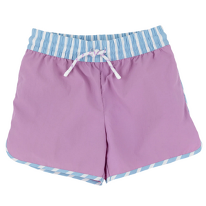 The Beaufort Bonnet Company's Baby Boys' and Boys' Tanner Trunks in light purple feature a blue and white striped elastic waistband, white drawstring, and matching leg trim, shown on a white background.