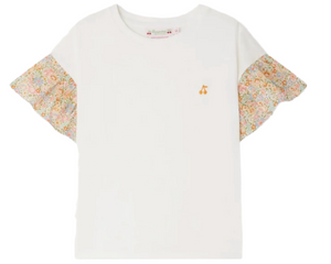 The Girls' Ezell T-shirt in Milk White by Bonpoint features ruffled sleeves, a floral pattern, and a small yellow cherry emblem—perfectly charming for any occasion.
