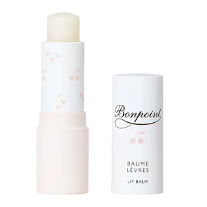 A white tube of Bonpoint Moisturizing & Protective Lip Balm 4g with the cap off reveals the light balm inside. Formulated with shea butter, it nourishes lips, leaving them soft and hydrated.