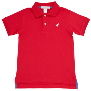 The Beaufort Bonnet Company's Baby Boys' and Boys' Prim & Proper Polo features short sleeves, a collar, two white buttons, and a small white bird logo on the left chest.