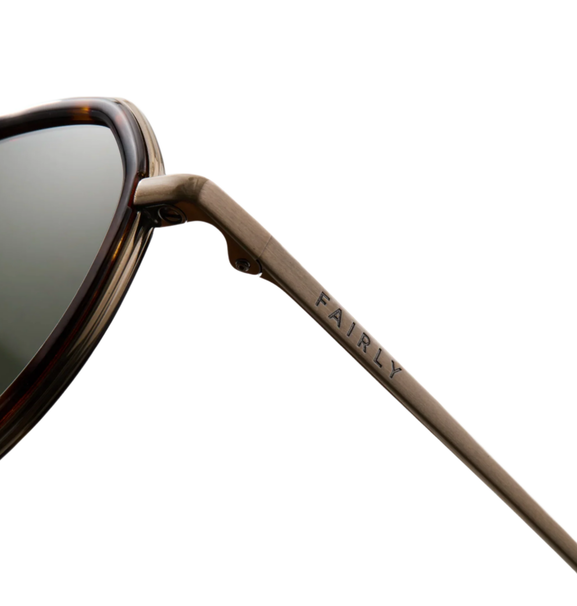Close-up of The Spiaggia sunglasses by Jimmy Fairly, featuring a tortoiseshell acetate frame and "FAIRLY" engraved on the metal arm, set against a white background.