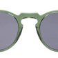 The Noto by Jimmy Fairly: round sunglasses with a green translucent acetate frame, dark lenses, and thin black arms shown on a white background. Lightweight for all-day comfort.
