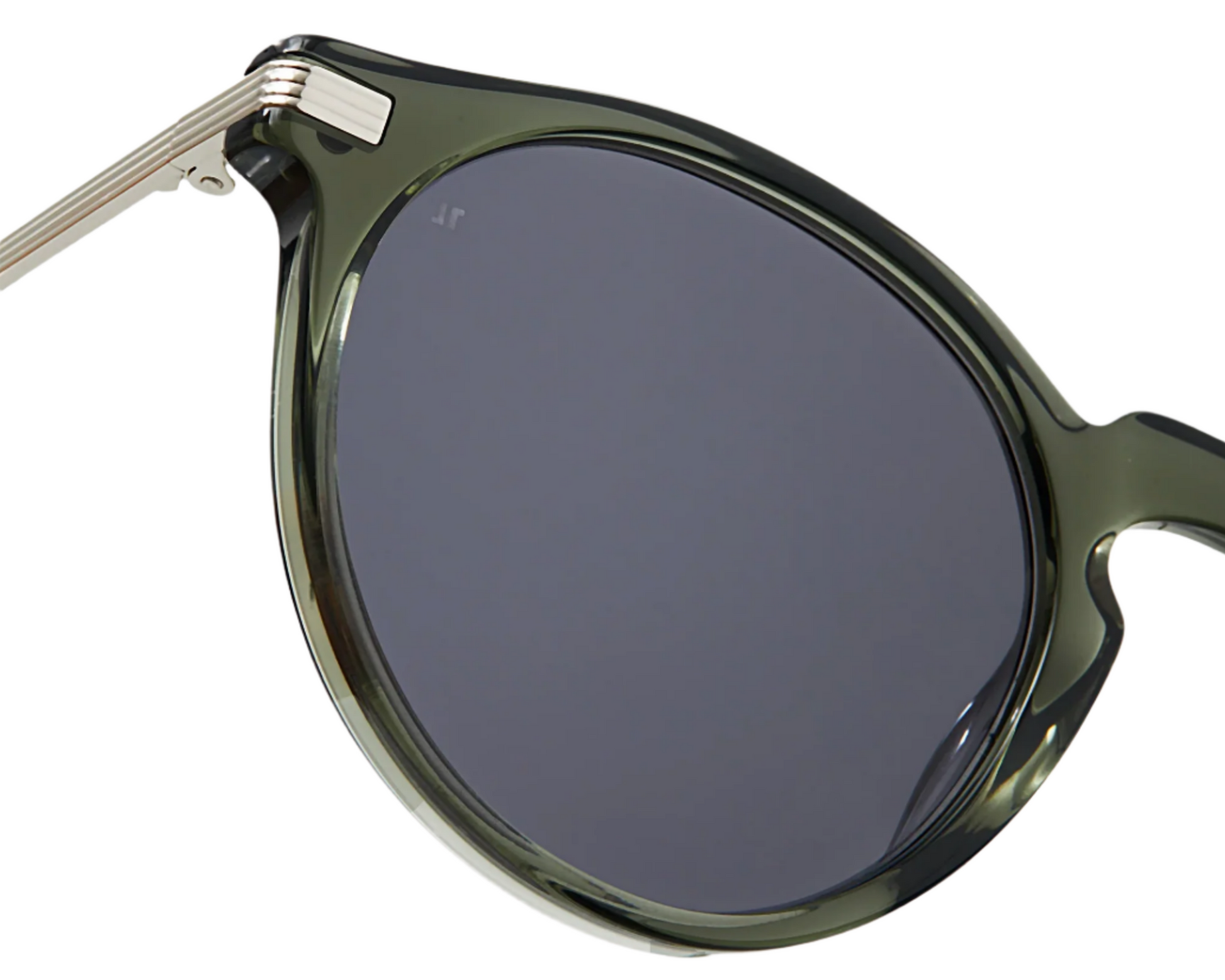 Close-up of The Noto by Jimmy Fairly, featuring round dark green acetate frames, dark tinted lenses, and a lightweight silver hinge on the temple.