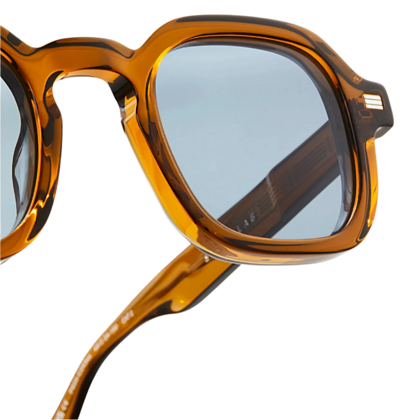 Close-up of The Ezra by Jimmy Fairly: brown tortoiseshell square sunglasses with blue-tinted lenses and thick recycled acetate frames.