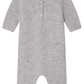 The Bonpoint Baby Boys' Tinoe All in One Outfit is a grey knit long-sleeve onesie with snap buttons down the back, closed feet, and an embroidered dog detail, shown laid flat with the back facing up.