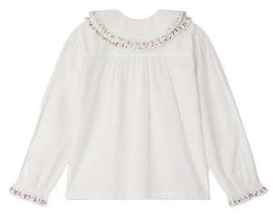 The Bonpoint Girls' Janeke Blouse, crafted from pleated organic cotton, features an embroidered collar and is shown from the back.