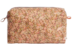 The Bonpoint Trousse Quilted Pencil Case is crafted from coated cotton Liberty fabric with a pink, peach, and brown floral pattern—ideal for organizing baby essentials. Shown against a white background.