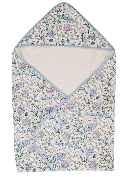The Timo & Violet Hooded Bath Towel features a blue and white ocean-themed print with sea plants, animals, and light blue trim—ideal as a baby swim towel or toddler towel for cozy comfort after water play.