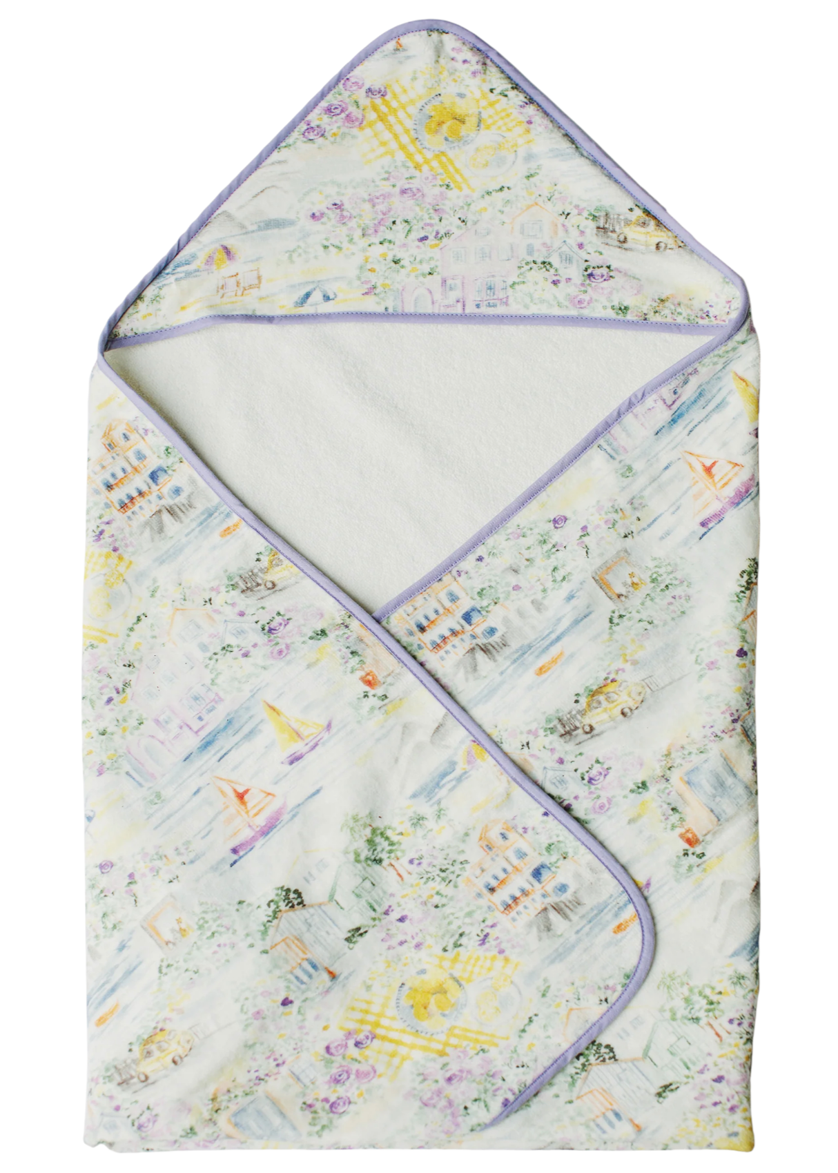 The Timo & Violet Hooded Bath Towel features a pastel cityscape and floral print with light purple trim—ideal as a cozy toddler towel or kids bath towel for snuggling after bath time.