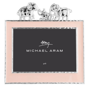The Michael Aram Elephant Frame 4x6 - Pink features a silver design with pink borders and playful elephant accents, perfect for displaying cherished children’s photos. Fits a 4x6 picture.