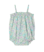 The Bonpoint Baby Girls' Nefle Romper features a pastel floral Liberty fabric, thin shoulder straps, elasticized top and leg openings, and is shown against a white background.