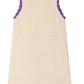 The Girls' Lali Hand-Crocheted Dress by Bonpoint is a cream sleeveless crochet dress with purple scalloped trim on the neck, armholes, and hem—ideal for summer.