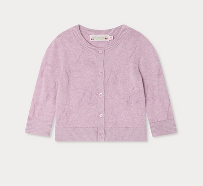 The Bonpoint Girls' Teyana Cardigan is a light purple, long-sleeve knit in soft organic cotton with front buttons and a round neckline, shown on a white background.