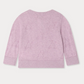 The Girls' Teyana Cardigan by Bonpoint is a light purple organic cotton knit sweater with long sleeves, ribbed cuffs and hem, and subtle textured patterns, shown from the back.