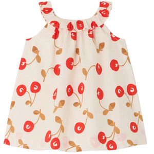 The Bonpoint Baby Girls' and Girls' Niniki Ruffled Dress is a sleeveless cream dress with a ruffled neckline, decorated with a red and brown cherry print and made from soft organic cotton.