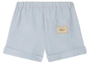 Bonpoint Baby Boys' and Boys' Ecady Shorts in light blue chambray feature rolled cuffs, a comfy elastic waistband, and a back patch pocket with a beige Bonpoint label.