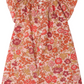 The Bonpoint Baby Girls' and Girls' Carmella Smocked Dress is a short-sleeve style crafted from Liberty fabric, featuring a pink background with red and orange flowers and white front buttons.