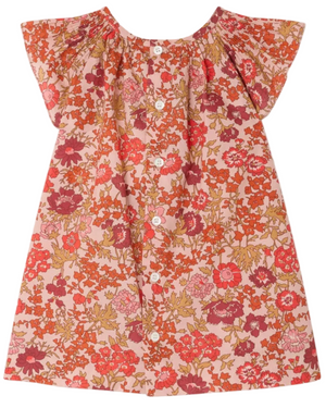 The Bonpoint Baby Girls' and Girls' Carmella Smocked Dress is a short-sleeve style crafted from Liberty fabric, featuring a pink background with red and orange flowers and white front buttons.