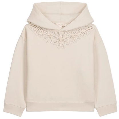 Louise Misha Girls’ Osalia Sweatshirt in beige fleece, featuring a hood and a decorative lace collar detail, displayed against a plain white background.