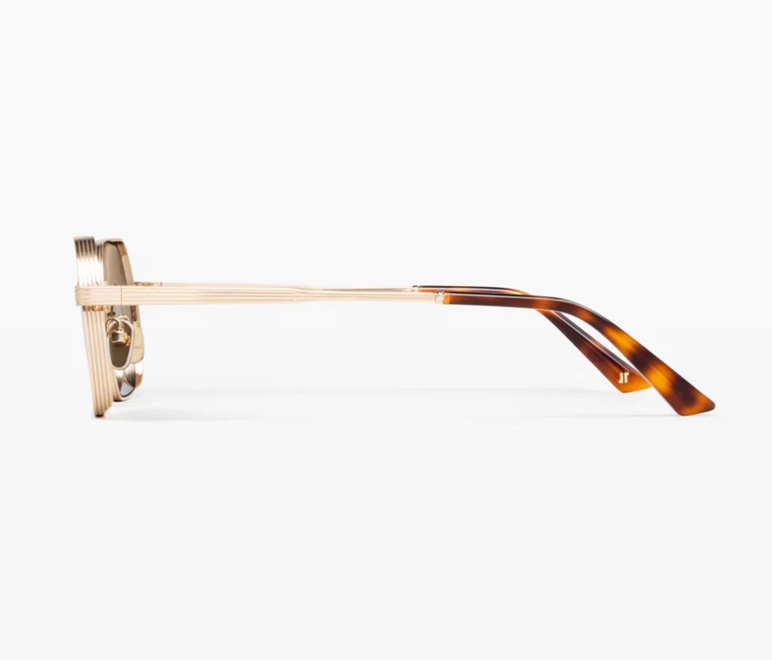 Side view of the Jimmy Fairly Ben eyeglasses, featuring a translucent, gold-toned stainless steel frame with tortoiseshell-patterned acetate sleeves on the temples, set against a plain white background.