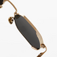 Close-up of Jimmy Fairly's Ben sunglasses, featuring gold stainless steel round frames with black lenses, detailed nose pads, and acetate sleeves, set against a plain white background.